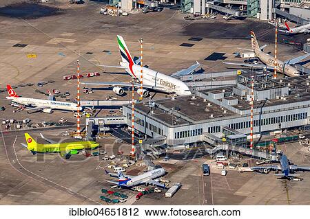 Terminal with aircrafts, various airlines, Düsseldorf Airport, North Rhine-Westphalia, Germany, Europe View Large Photo Image Stock Image - Terminal with aircrafts, various airlines, Düsseldorf Airport, North Rhine-Westphalia, Germany, Europe. Fotosearch