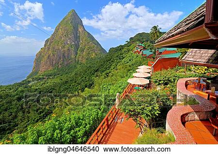 Stock Image - Terrace and complex of the Ladera Resort with the Petit Piton 743m, Soufriere, St. Lucia, Lesser Antilles, West Indies, Caribbean Islands. Fotosearch