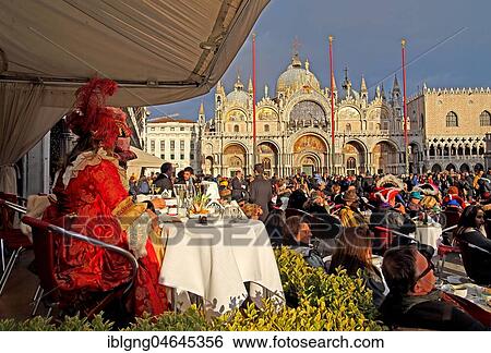 Stock Photograph - Terrace of Cafe Quadri on Piazza San Marco during Carnival in Venice, Italy, Europe. Fotosearch
