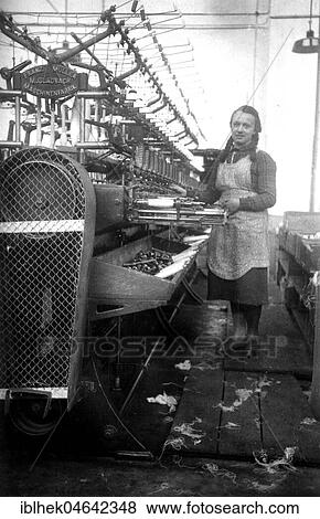 Textile industry, woman works in a spinning mill, 1930s, Mönchengladbach, Germany, Europe View Large Photo Image Stock Photo - Textile industry, woman works in a spinning mill, 1930s, Mönchengladbach, Germany, Europe. Fotosearch