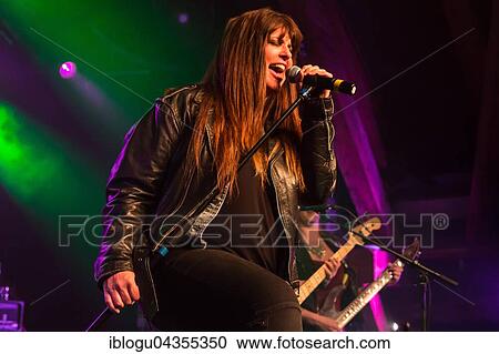 The American women's metal band The Iron Maidens, tribute band of the British heavy metal band Iron Maiden live in the Schüür Lucerne, Switzerland vocals Kirsten Rosenberg drumset Linda McDonald guitar Courtney Cox guitar Nita Strauss View Large Photo Image Stock Image - The American women's metal band The Iron Maidens, tribute band of the British heavy metal band Iron Maiden live in the Schüür Lucerne, Switzerland vocals Kirsten Rosenberg drumset Linda McDonald guitar Courtney Cox guitar Nita Strauss. Fotosearch