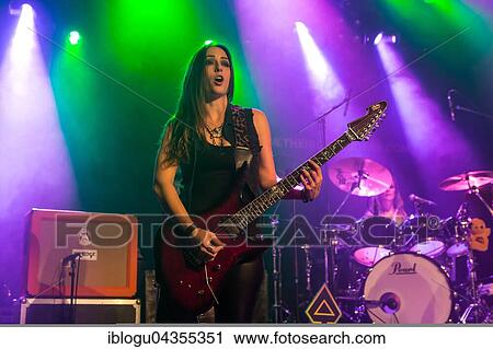 The American women's metal band The Iron Maidens, tribute band of the British heavy metal band Iron Maiden live in the Schüür Lucerne, Switzerland vocals Kirsten Rosenberg drumset Linda McDonald guitar Courtney Cox guitar Nita Strauss View Large Photo Image Stock Image - The American women's metal band The Iron Maidens, tribute band of the British heavy metal band Iron Maiden live in the Schüür Lucerne, Switzerland vocals Kirsten Rosenberg drumset Linda McDonald guitar Courtney Cox guitar Nita Strauss. Fotosearch