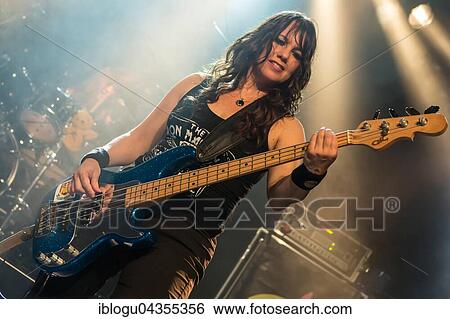 The American women's metal band The Iron Maidens, tribute band of the British heavy metal band Iron Maiden live in the Schüür Lucerne, Switzerland vocals Kirsten Rosenberg drumset Linda McDonald guitar Courtney Cox guitar Nita Strauss View Large Photo Image Stock Photograph - The American women's metal band The Iron Maidens, tribute band of the British heavy metal band Iron Maiden live in the Schüür Lucerne, Switzerland vocals Kirsten Rosenberg drumset Linda McDonald guitar Courtney Cox guitar Nita Strauss. Fotosearch