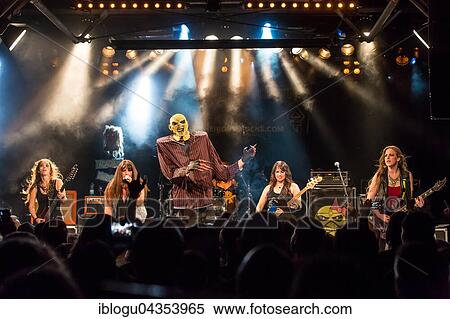 The American women's metal band The Iron Maidens, tribute band of the British heavy metal band Iron Maiden live in the Schüür Lucerne, Switzerland vocals Kirsten Rosenberg drumset Linda McDonald guitar Courtney Cox guitar Nita Strauss View Large Photo Image Stock Photography - The American women's metal band The Iron Maidens, tribute band of the British heavy metal band Iron Maiden live in the Schüür Lucerne, Switzerland vocals Kirsten Rosenberg drumset Linda McDonald guitar Courtney Cox guitar Nita Strauss. Fotosearch