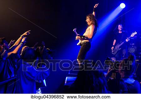 Stock Image - The Australian hard rock band Airbourne live at the Blue Balls Festival Lucerne, Switzerland Joel O' Keeffe, vocals and guitar David Roads, guitar Justin Street, bass Ryan O' Keeffe, drums. Fotosearch