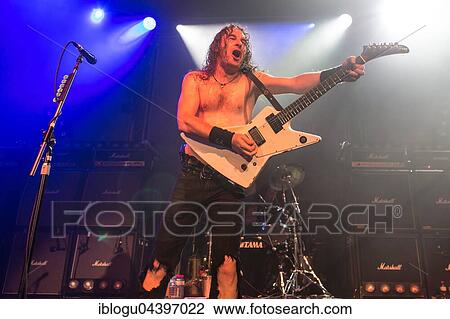 Stock Image - The Australian hard rock band Airbourne live at the Blue Balls Festival Lucerne, Switzerland Joel O' Keeffe, vocals and guitar David Roads, guitar Justin Street, bass Ryan O' Keeffe, drums. Fotosearch