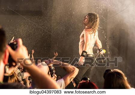 Stock Image - The Australian hard rock band Airbourne live at the Blue Balls Festival Lucerne, Switzerland Joel O' Keeffe, vocals and guitar David Roads, guitar Justin Street, bass Ryan O' Keeffe, drums. Fotosearch