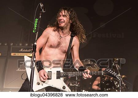 Stock Photo - The Australian hard rock band Airbourne live at the Blue Balls Festival Lucerne, Switzerland Joel O' Keeffe, vocals and guitar David Roads, guitar Justin Street, bass Ryan O' Keeffe, drums. Fotosearch