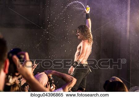 Stock Photography - The Australian hard rock band Airbourne live at the Blue Balls Festival Lucerne, Switzerland Joel O' Keeffe, vocals and guitar David Roads, guitar Justin Street, bass Ryan O' Keeffe, drums. Fotosearch