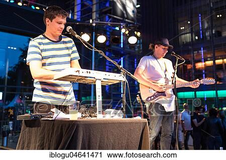 Stock Image - The Australian musician duo Jamie MacDowell and Tom Thum live at the 25th Blue Balls Festival in Lucerne, Switzerland, Europe. Fotosearch