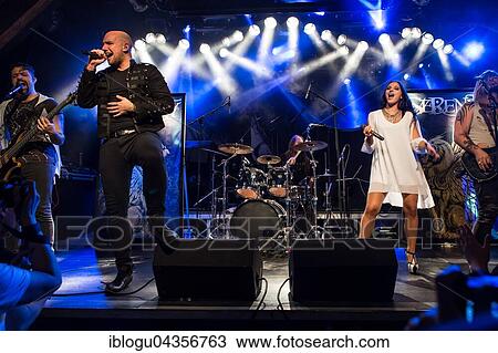 Stock Image - The Austrian Symphonic-Metal-Band Serenity with singer Georg Neuhauser and singer Natascha Koch live in the Schüür Lucerne, Switzerland, Europe. Fotosearch