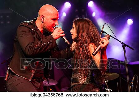 The Austrian Symphonic-Metal-Band Serenity with singer Georg Neuhauser and singer Natascha Koch live in the Schüür Lucerne, Switzerland, Europe View Large Photo Image Stock Photo - The Austrian Symphonic-Metal-Band Serenity with singer Georg Neuhauser and singer Natascha Koch live in the Schüür Lucerne, Switzerland, Europe. Fotosearch