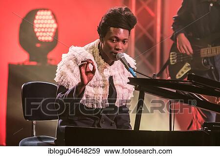 The British musician and songwriter Benjamin Clementine live at the 25th Blue Balls Festival in Lucerne, Switzerland, Europe View Large Photo Image Stock Photo - The British musician and songwriter Benjamin Clementine live at the 25th Blue Balls Festival in Lucerne, Switzerland, Europe. Fotosearch