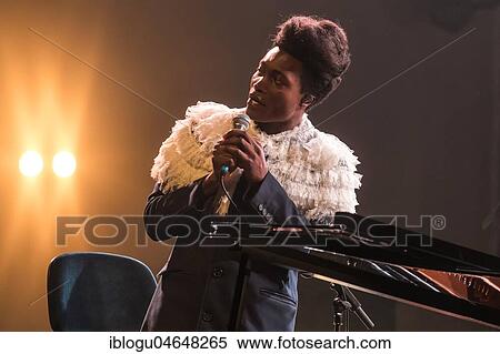 The British musician and songwriter Benjamin Clementine live at the 25th Blue Balls Festival in Lucerne, Switzerland, Europe View Large Photo Image Stock Photography - The British musician and songwriter Benjamin Clementine live at the 25th Blue Balls Festival in Lucerne, Switzerland, Europe. Fotosearch