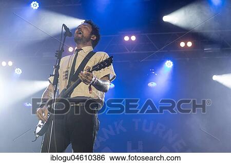 Stock Photograph - The British musician Frank Turner & The Sleeping Souls live at the 27th Heitere Open Air in Zofingen, Aargau, Switzerland, Europe. Fotosearch