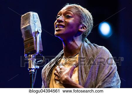The British singer and songwriter Ala. ni live at the Blue Balls Festival Lucerne, Switzerland, Europe View Large Photo Image Stock Image - The British singer and songwriter Ala. ni live at the Blue Balls Festival Lucerne, Switzerland, Europe. Fotosearch