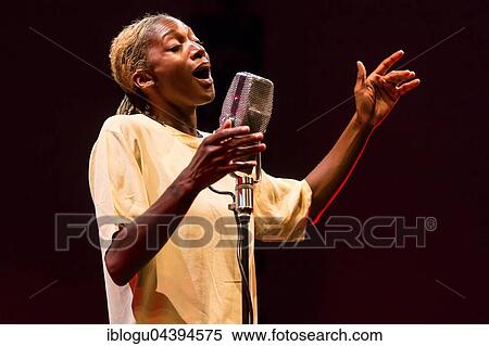 The British singer and songwriter Ala. ni live at the Blue Balls Festival Lucerne, Switzerland, Europe View Large Photo Image Stock Photography - The British singer and songwriter Ala. ni live at the Blue Balls Festival Lucerne, Switzerland, Europe. Fotosearch