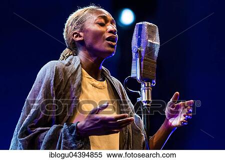 Stock Photography - The British singer and songwriter Ala. ni live at the Blue Balls Festival Lucerne, Switzerland, Europe. Fotosearch