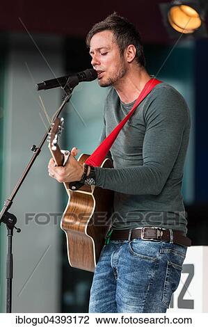 Stock Image - The British singer and songwriter Gareth Icke live at the Blue Balls Festival Lucerne, Switzerland, Europe. Fotosearch