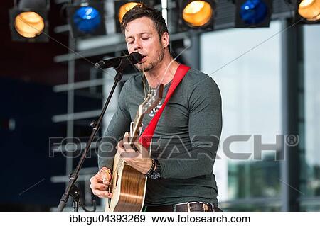 Stock Photo - The British singer and songwriter Gareth Icke live at the Blue Balls Festival Lucerne, Switzerland, Europe. Fotosearch