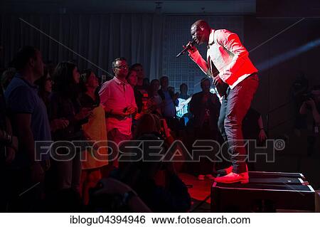 The British singer Seal live in the sold-out concert hall of the KKL at the Blue Balls Festival Lucerne, Switzerland, Europe View Large Photo Image Stock Photograph - The British singer Seal live in the sold-out concert hall of the KKL at the Blue Balls Festival Lucerne, Switzerland, Europe. Fotosearch