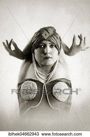 Stock Image - The dancer Veronika Canow with hands as antler, 1920s, Germany, Europe. Fotosearch
