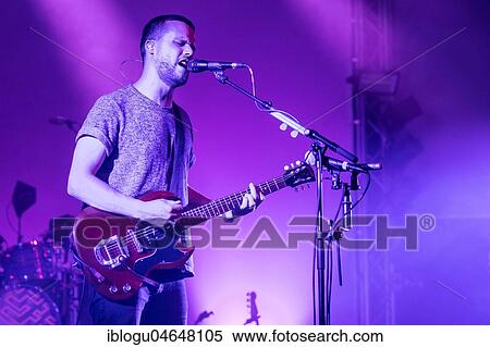 Stock Photography - The English alternative rock band White Lies with frontman Harry McVeigh live at the 25th Blue Balls Festival in Lucerne, Switzerland, Europe. Fotosearch