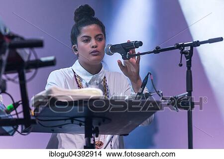 The French-Cuban music duo Ibeyi, which consists of the twin sisters Lisa-Kaindé and Naomi Díaz, will perform live at the Blue Balls Festival in Lucerne, Switzerland. View Large Photo Image Picture - The French-Cuban music duo Ibeyi, which consists of the twin sisters Lisa-Kaindé and Naomi Díaz, will perform live at the Blue Balls Festival in Lucerne, Switzerland.. Fotosearch