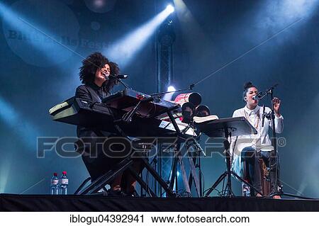 The French-Cuban music duo Ibeyi, which consists of the twin sisters Lisa-Kaindé and Naomi Díaz, will perform live at the Blue Balls Festival in Lucerne, Switzerland. View Large Photo Image Stock Image - The French-Cuban music duo Ibeyi, which consists of the twin sisters Lisa-Kaindé and Naomi Díaz, will perform live at the Blue Balls Festival in Lucerne, Switzerland.. Fotosearch