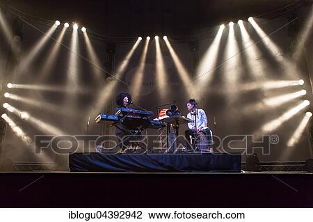 The French-Cuban music duo Ibeyi, which consists of the twin sisters Lisa-Kaindé and Naomi Díaz, will perform live at the Blue Balls Festival in Lucerne, Switzerland. View Large Photo Image Stock Image - The French-Cuban music duo Ibeyi, which consists of the twin sisters Lisa-Kaindé and Naomi Díaz, will perform live at the Blue Balls Festival in Lucerne, Switzerland.. Fotosearch