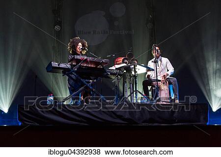 The French-Cuban music duo Ibeyi, which consists of the twin sisters Lisa-Kaindé and Naomi Díaz, will perform live at the Blue Balls Festival in Lucerne, Switzerland. View Large Photo Image Stock Photo - The French-Cuban music duo Ibeyi, which consists of the twin sisters Lisa-Kaindé and Naomi Díaz, will perform live at the Blue Balls Festival in Lucerne, Switzerland.. Fotosearch