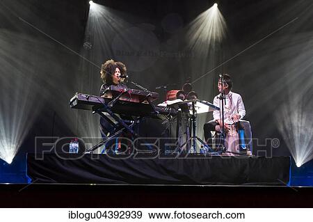 The French-Cuban music duo Ibeyi, which consists of the twin sisters Lisa-Kaindé and Naomi Díaz, will perform live at the Blue Balls Festival in Lucerne, Switzerland. View Large Photo Image Stock Photo - The French-Cuban music duo Ibeyi, which consists of the twin sisters Lisa-Kaindé and Naomi Díaz, will perform live at the Blue Balls Festival in Lucerne, Switzerland.. Fotosearch