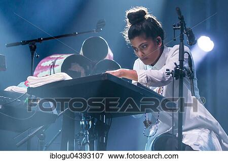 The French-Cuban music duo Ibeyi, which consists of the twin sisters Lisa-Kaindé and Naomi Díaz, will perform live at the Blue Balls Festival in Lucerne, Switzerland. View Large Photo Image Stock Photo - The French-Cuban music duo Ibeyi, which consists of the twin sisters Lisa-Kaindé and Naomi Díaz, will perform live at the Blue Balls Festival in Lucerne, Switzerland.. Fotosearch