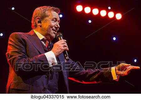 The German pop singer Roland Kaiser live at the 16th Schlager Nacht in Lucerne, Switzerland, Europe View Large Photo Image Stock Photography - The German pop singer Roland Kaiser live at the 16th Schlager Nacht in Lucerne, Switzerland, Europe. Fotosearch