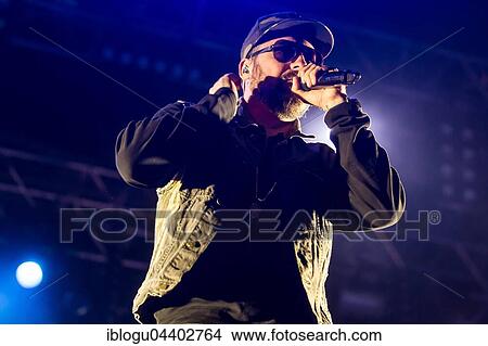 The German rapper and producer Paul Hartmut Würdig alias Sido live at the 26th Heitere Open Air in Zofingen, Aargau, Switzerland, Europe View Large Photo Image Picture - The German rapper and producer Paul Hartmut Würdig alias Sido live at the 26th Heitere Open Air in Zofingen, Aargau, Switzerland, Europe. Fotosearch
