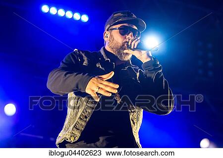 Stock Image - The German rapper and producer Paul Hartmut Würdig alias Sido live at the 26th Heitere Open Air in Zofingen, Aargau, Switzerland, Europe. Fotosearch