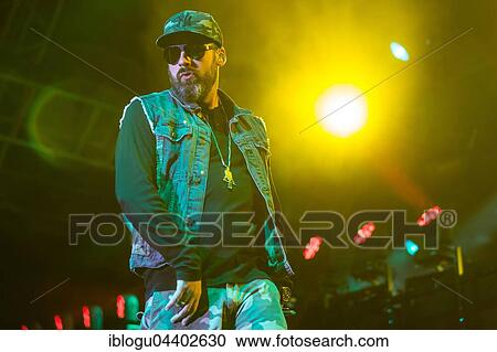 Stock Image - The German rapper and producer Paul Hartmut Würdig alias Sido live at the 26th Heitere Open Air in Zofingen, Aargau, Switzerland, Europe. Fotosearch