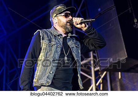 Stock Image - The German rapper and producer Paul Hartmut Würdig alias Sido live at the 26th Heitere Open Air in Zofingen, Aargau, Switzerland, Europe. Fotosearch