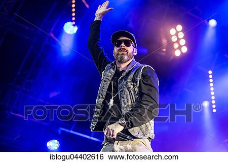 The German rapper and producer Paul Hartmut Würdig alias Sido live at the 26th Heitere Open Air in Zofingen, Aargau, Switzerland, Europe View Large Photo Image Stock Photograph - The German rapper and producer Paul Hartmut Würdig alias Sido live at the 26th Heitere Open Air in Zofingen, Aargau, Switzerland, Europe. Fotosearch