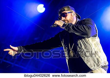 Stock Photograph - The German rapper and producer Paul Hartmut Würdig alias Sido live at the 26th Heitere Open Air in Zofingen, Aargau, Switzerland, Europe. Fotosearch