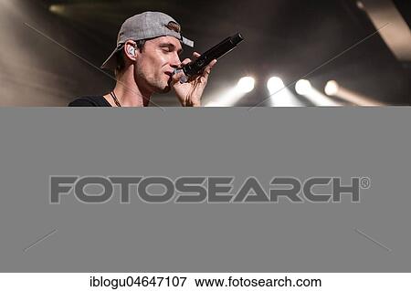 Stock Photo - The Irish alternative rock band Walking on Cars live at the 25th Blue Balls Festival in Lucerne, Switzerland Patrick Sheehy, vocals Sorcha Durham, piano, backing vocals Dan Devane, guitar, background vocals Paul Flannery, bass, backgroundgesa. Fotosearch