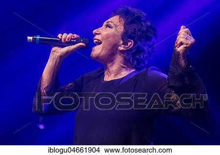 The Italian pop group Ricchi e Poveri with singer Angela Brambati and singer Angelo Sotgiu live at Schlager Nacht, Lucerne, Switzerland, Europe View Large Photo Image Picture - The Italian pop group Ricchi e Poveri with singer Angela Brambati and singer Angelo Sotgiu live at Schlager Nacht, Lucerne, Switzerland, Europe. Fotosearch