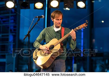 The New Zealand singer and songwriter Mathew James White live at the 25th Blue Balls Festival in Lucerne, Switzerland, Europe View Large Photo Image Stock Photography - The New Zealand singer and songwriter Mathew James White live at the 25th Blue Balls Festival in Lucerne, Switzerland, Europe. Fotosearch