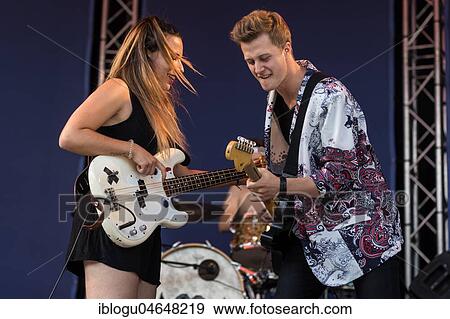 The Swiss band Mama Jefferson with singer Vanja Vukelic, guitarist Silvan Gerhard and drummer Mattia Ferrari, live at the 25th Blue Balls Festival in Lucerne, Switzerland, Europe View Large Photo Image Stock Photo - The Swiss band Mama Jefferson with singer Vanja Vukelic, guitarist Silvan Gerhard and drummer Mattia Ferrari, live at the 25th Blue Balls Festival in Lucerne, Switzerland, Europe. Fotosearch