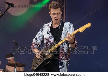 Stock Photo - The Swiss band Mama Jefferson with singer Vanja Vukelic, guitarist Silvan Gerhard and drummer Mattia Ferrari, live at the 25th Blue Balls Festival in Lucerne, Switzerland, Europe. Fotosearch