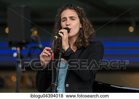 The Swiss dialect singer Milena live at the Blue Balls Festival Lucerne, Switzerland Milena Dürst: Vocals, Compositions Mischa Maurer: Piano Valentin v. Fischer: Double Bass View Large Photo Image Stock Photo - The Swiss dialect singer Milena live at the Blue Balls Festival Lucerne, Switzerland Milena Dürst: Vocals, Compositions Mischa Maurer: Piano Valentin v. Fischer: Double Bass. Fotosearch