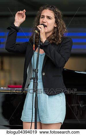 The Swiss dialect singer Milena live at the Blue Balls Festival Lucerne, Switzerland Milena Dürst: Vocals, Compositions Mischa Maurer: Piano Valentin v. Fischer: Double Bass View Large Photo Image Stock Photo - The Swiss dialect singer Milena live at the Blue Balls Festival Lucerne, Switzerland Milena Dürst: Vocals, Compositions Mischa Maurer: Piano Valentin v. Fischer: Double Bass. Fotosearch