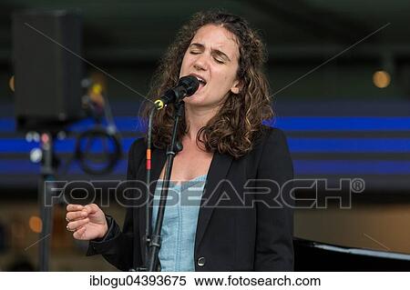 The Swiss dialect singer Milena live at the Blue Balls Festival Lucerne, Switzerland Milena Dürst: Vocals, Compositions Mischa Maurer: Piano Valentin v. Fischer: Double Bass View Large Photo Image Stock Photography - The Swiss dialect singer Milena live at the Blue Balls Festival Lucerne, Switzerland Milena Dürst: Vocals, Compositions Mischa Maurer: Piano Valentin v. Fischer: Double Bass. Fotosearch