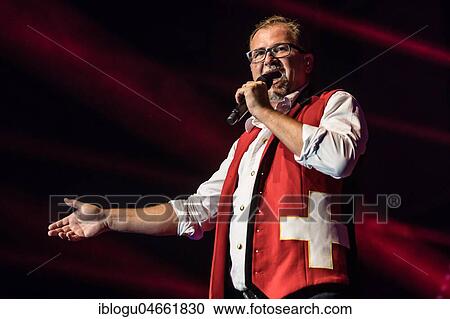 The Swiss folk musician and pop singer Stefan Roos live at the Schlager Nacht in Lucerne, Switzerland, Europe View Large Photo Image Stock Image - The Swiss folk musician and pop singer Stefan Roos live at the Schlager Nacht in Lucerne, Switzerland, Europe. Fotosearch