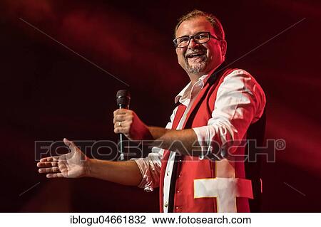 Stock Image - The Swiss folk musician and pop singer Stefan Roos live at the Schlager Nacht in Lucerne, Switzerland, Europe. Fotosearch